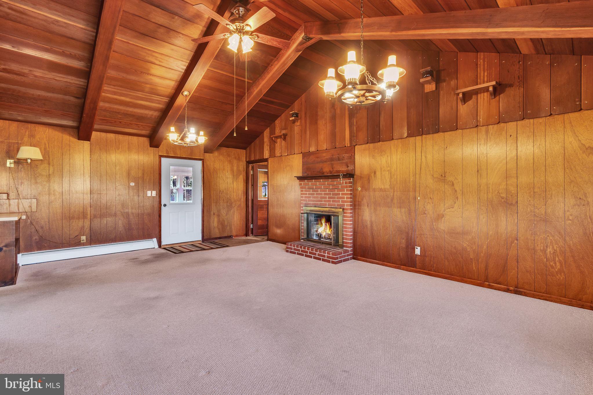 305 Colieville Lane Reedville, VA 22539 - Photo 6 of 49 Rustic charm with warm wooden accents.