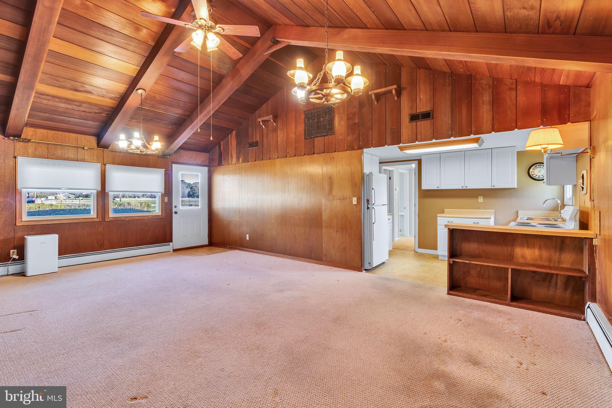 305 Colieville Lane Reedville, VA 22539 - Photo 9 of 49 Spacious room with rustic charm.