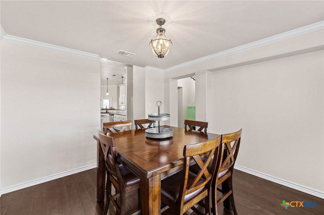 957 County Road 3350 Kempner, TX 76539 - Photo 15 of 35 a view of a dining table and chairs in the room