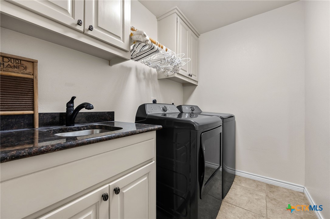 957 County Road 3350 Kempner, TX 76539 - Photo 25 of 35 a utility room with two washing machine
