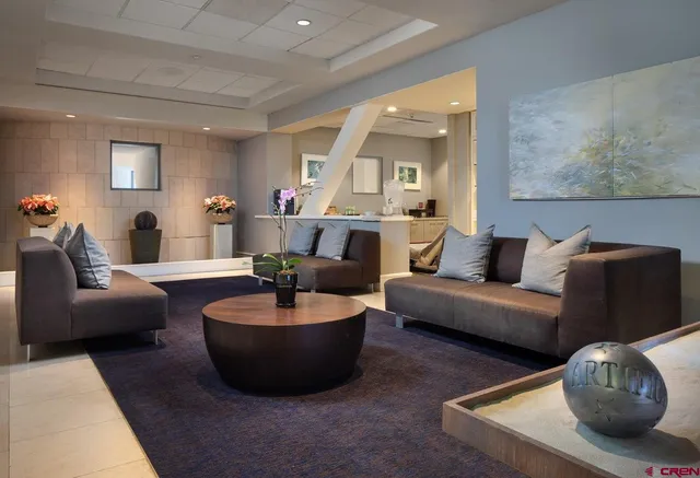 a living room with furniture and a couch