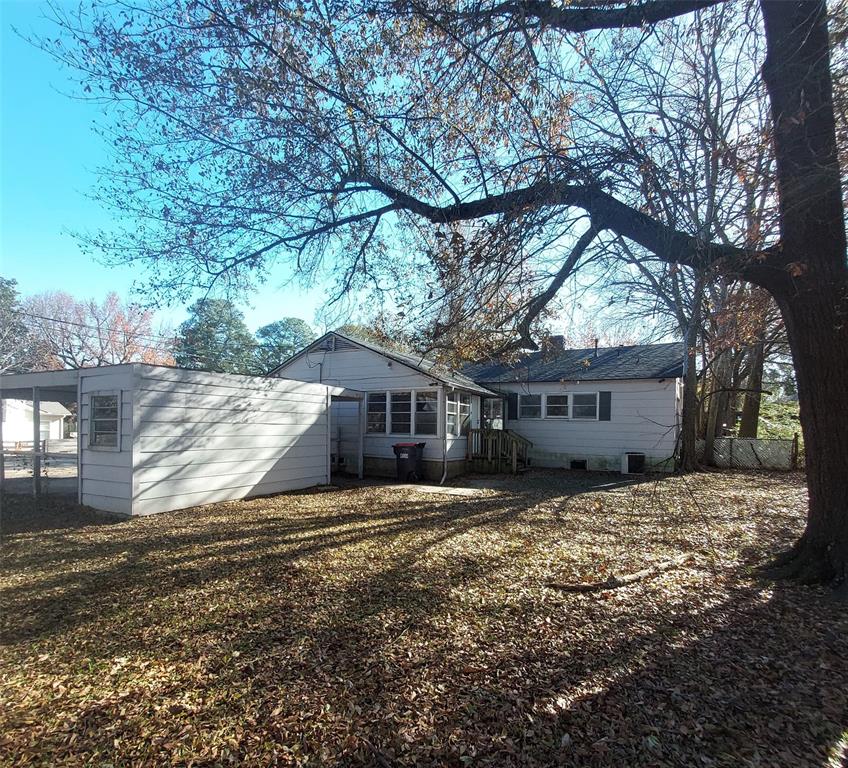 2131 Hubbard Street Paris, TX 75460 - Photo 13 of 14 a view of a house with a yard