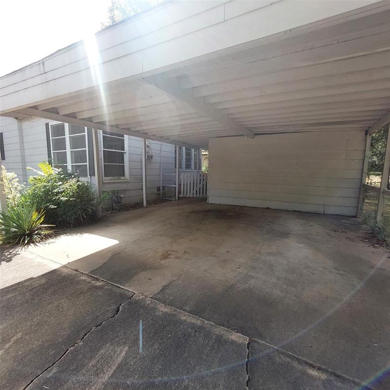 2131 Hubbard Street Paris, TX 75460 - Photo 14 of 14 a view of a backyard of a house
