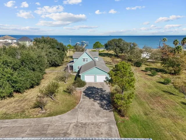a front view of a house with yard