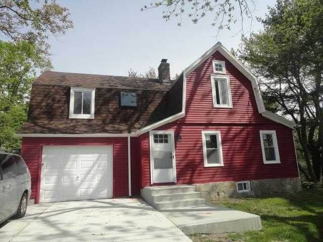18 Beech Street Trumbull, CT 06611 - Photo 1 of 1 a front view of a house with garden