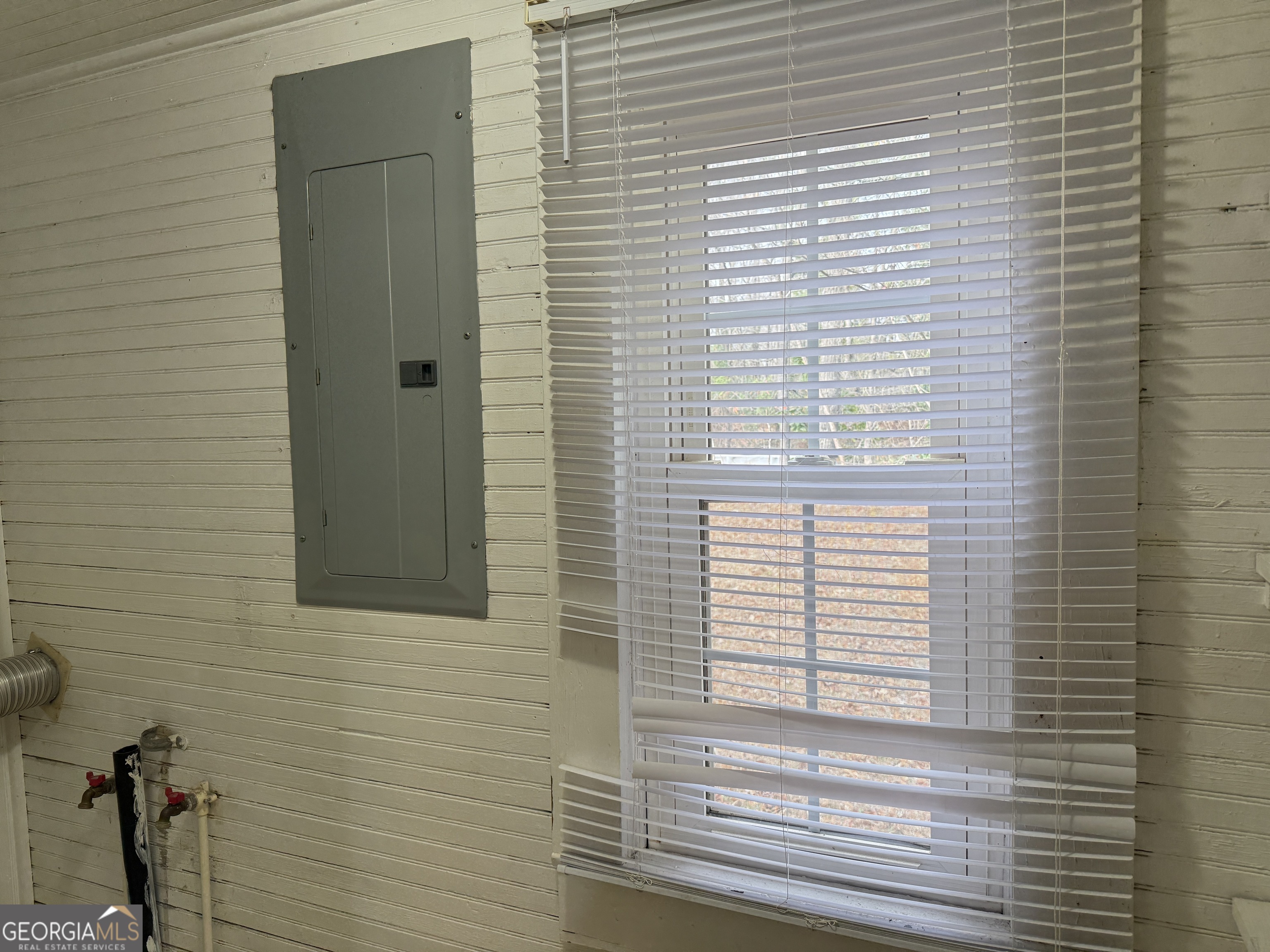 19 Truitt Street Manchester, GA 31816 - Photo 19 of 31 a view of a door and a window