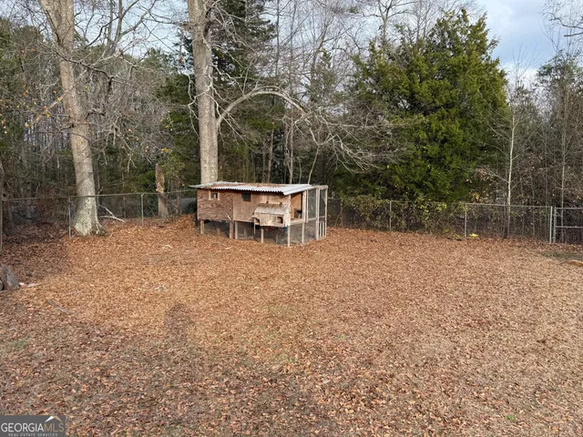 a house with trees in front of it