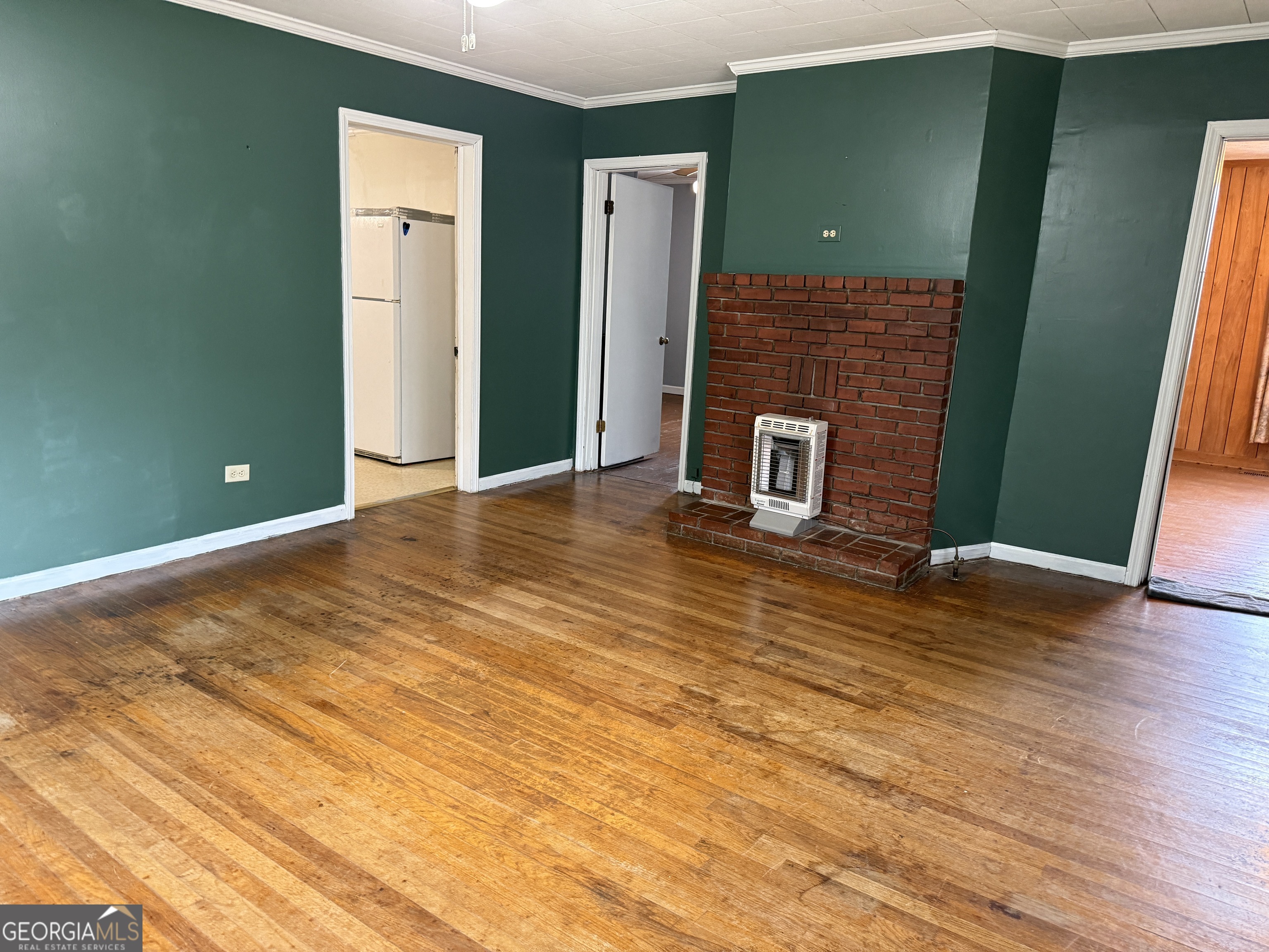 19 Truitt Street Manchester, GA 31816 - Photo 4 of 31 a view of a livingroom with furniture and wooden floor