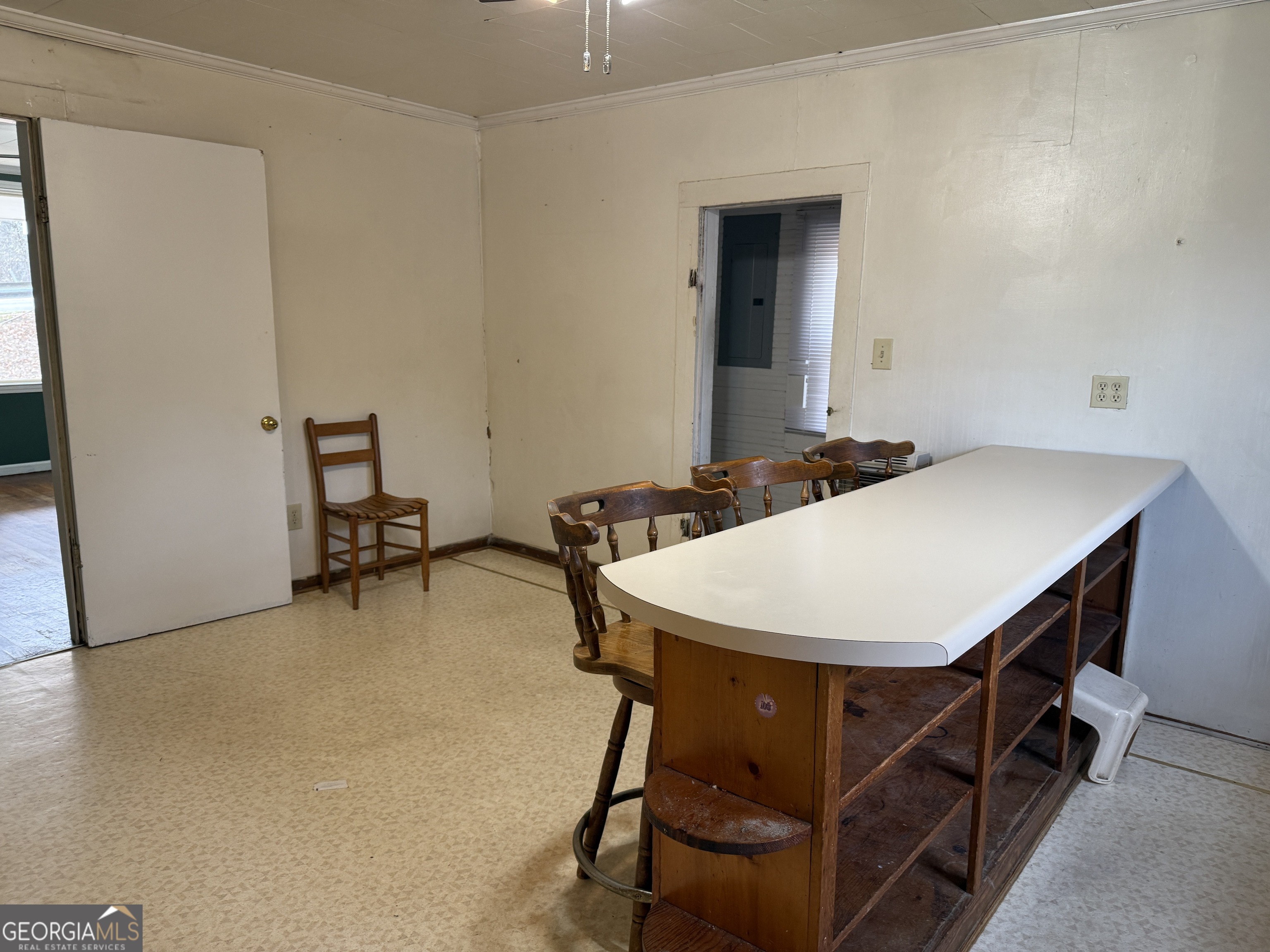 19 Truitt Street Manchester, GA 31816 - Photo 8 of 31 a dining room with a table and chairs