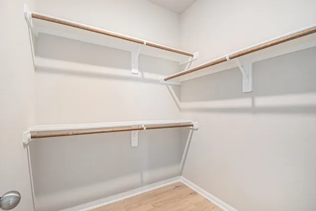 a view of small space with racks on the wall