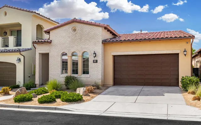 a view of a backyard with sitting area