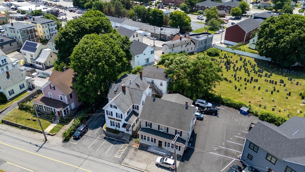 7 Prospect Street Woburn, MA 01801 - Photo 2 of 40 an aerial view of a house with garden space and street view