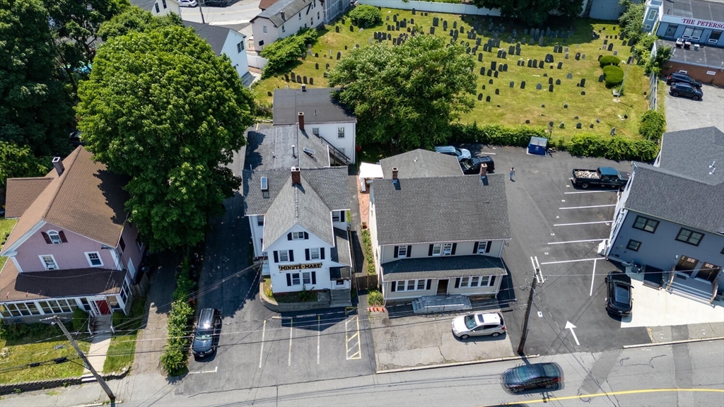 7 Prospect Street Woburn, MA 01801 - Photo 33 of 40 an aerial view of a house with garden space and street view