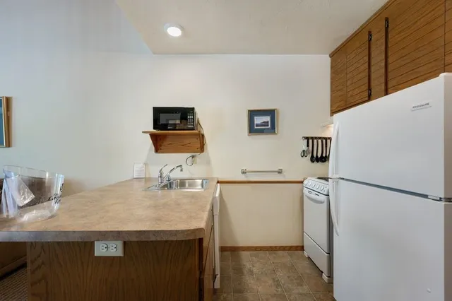 $90,000 | 7741 Highway 42, Unit 212, Egg Harbor, WI 54209