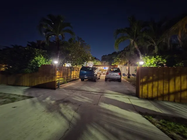 a view of street with parked cars