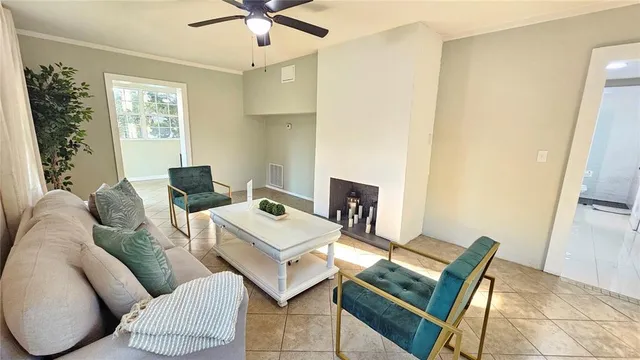 a living room with furniture and a window