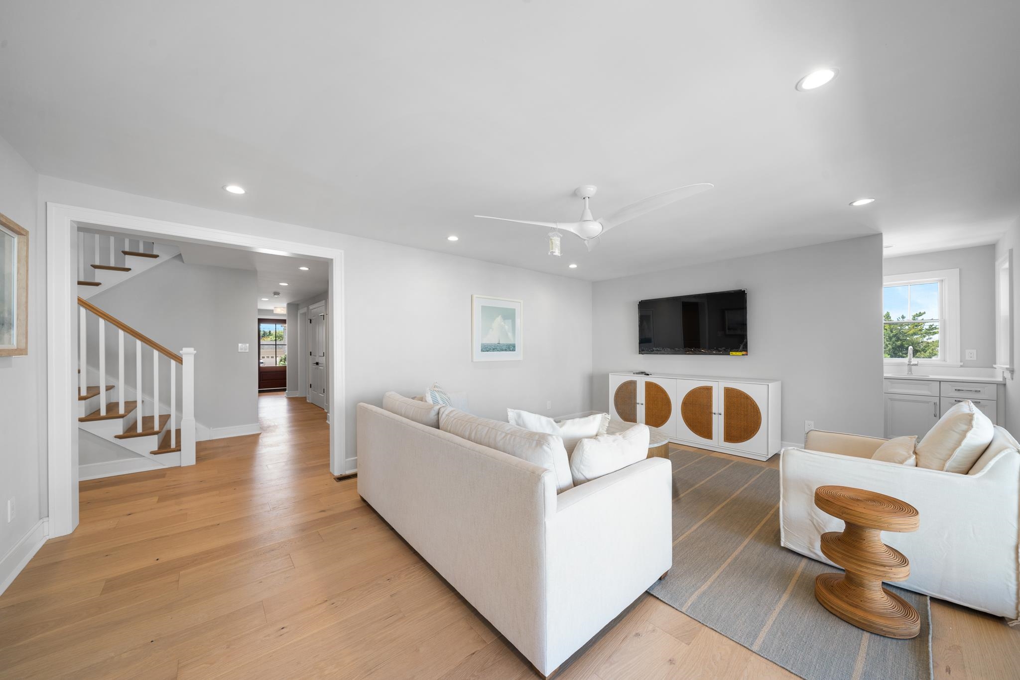 285 58th Street Avalon, NJ 08202 - Photo 11 of 50 a living room with furniture and a flat screen tv
