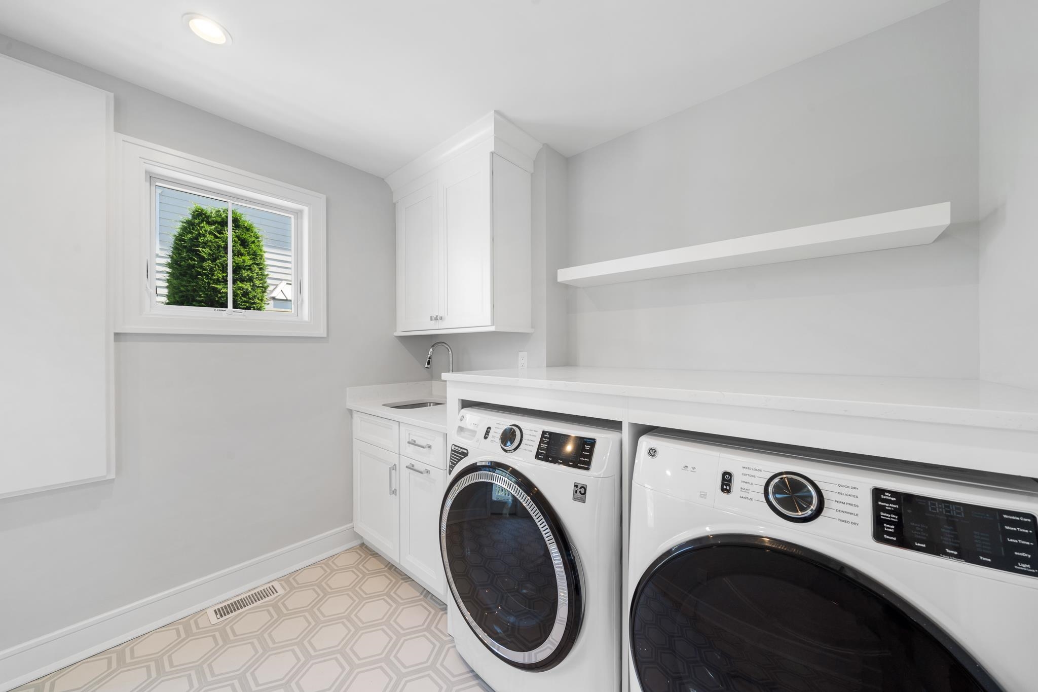 285 58th Street Avalon, NJ 08202 - Photo 14 of 50 a utility room with dryer and washer