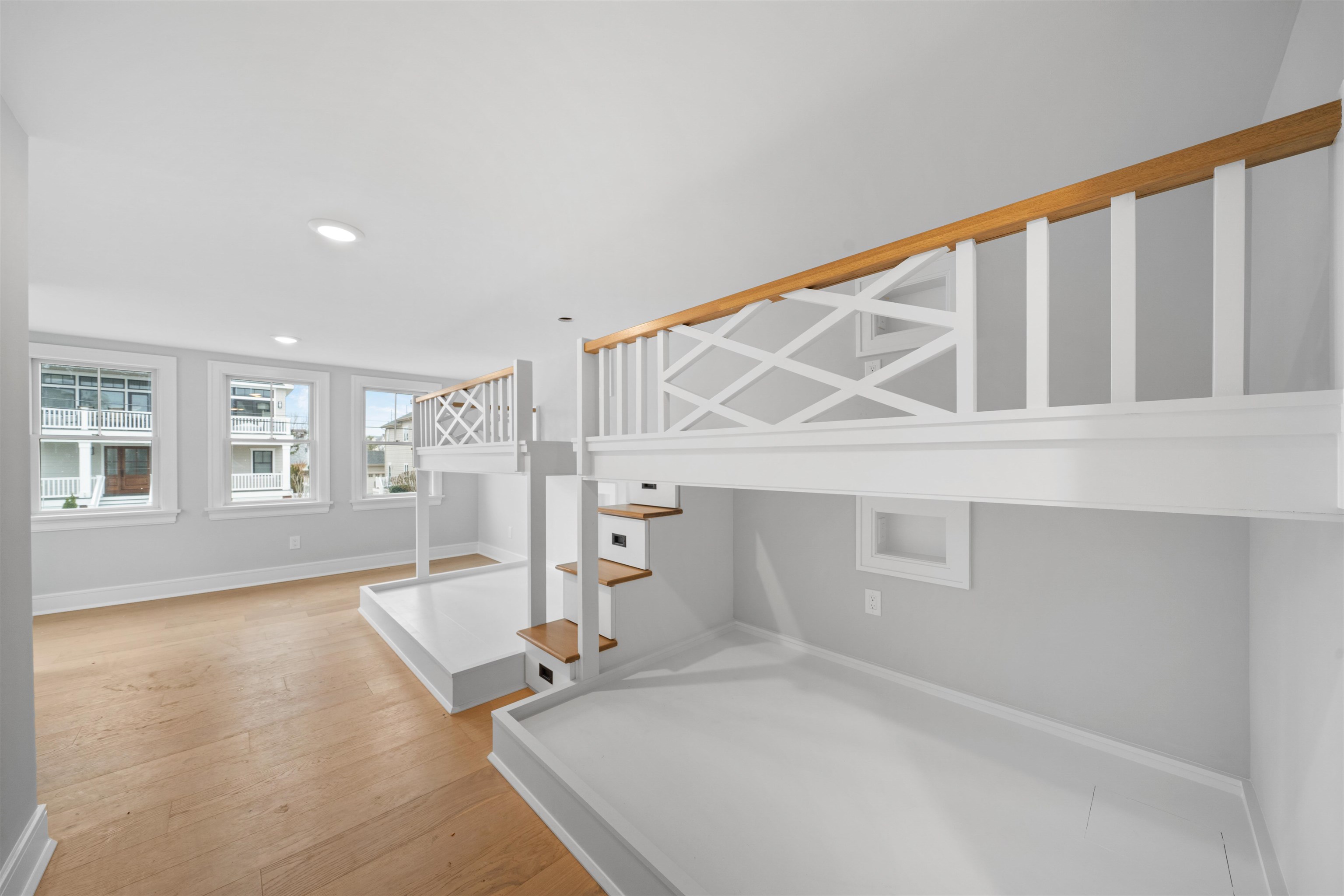 285 58th Street Avalon, NJ 08202 - Photo 19 of 50 a view of a livingroom with wooden floor and a window
