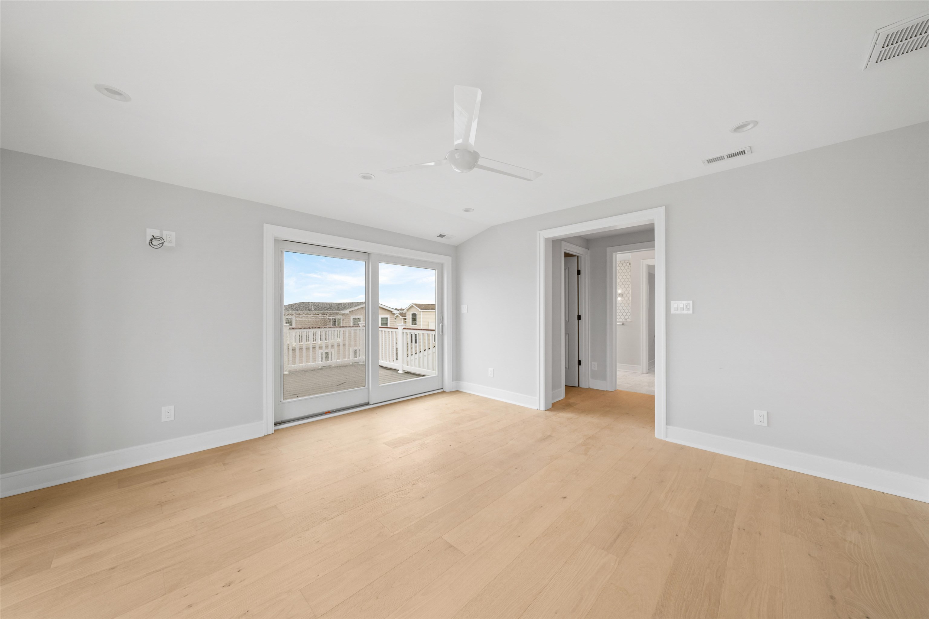 285 58th Street Avalon, NJ 08202 - Photo 20 of 50 a view of an empty room with window
