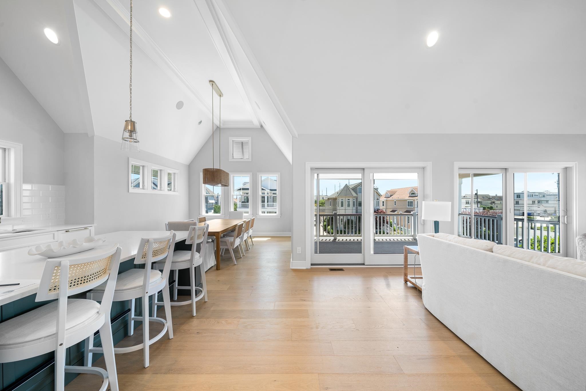 285 58th Street Avalon, NJ 08202 - Photo 28 of 50 a view of a dining room with furniture large windows and wooden floor