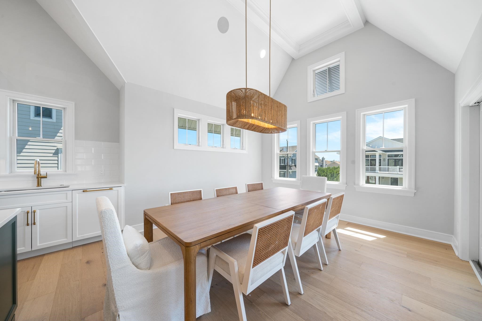 285 58th Street Avalon, NJ 08202 - Photo 31 of 50 a view of a dining room and a table and chairs