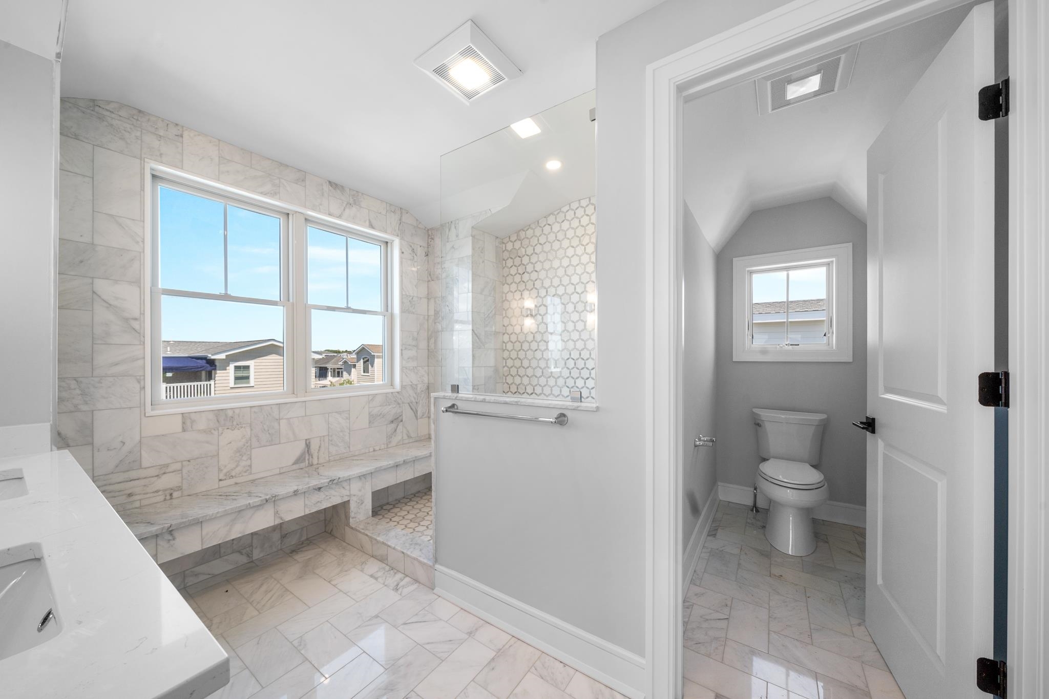 285 58th Street Avalon, NJ 08202 - Photo 42 of 50 a spacious bathroom with a bathtub and a toilet