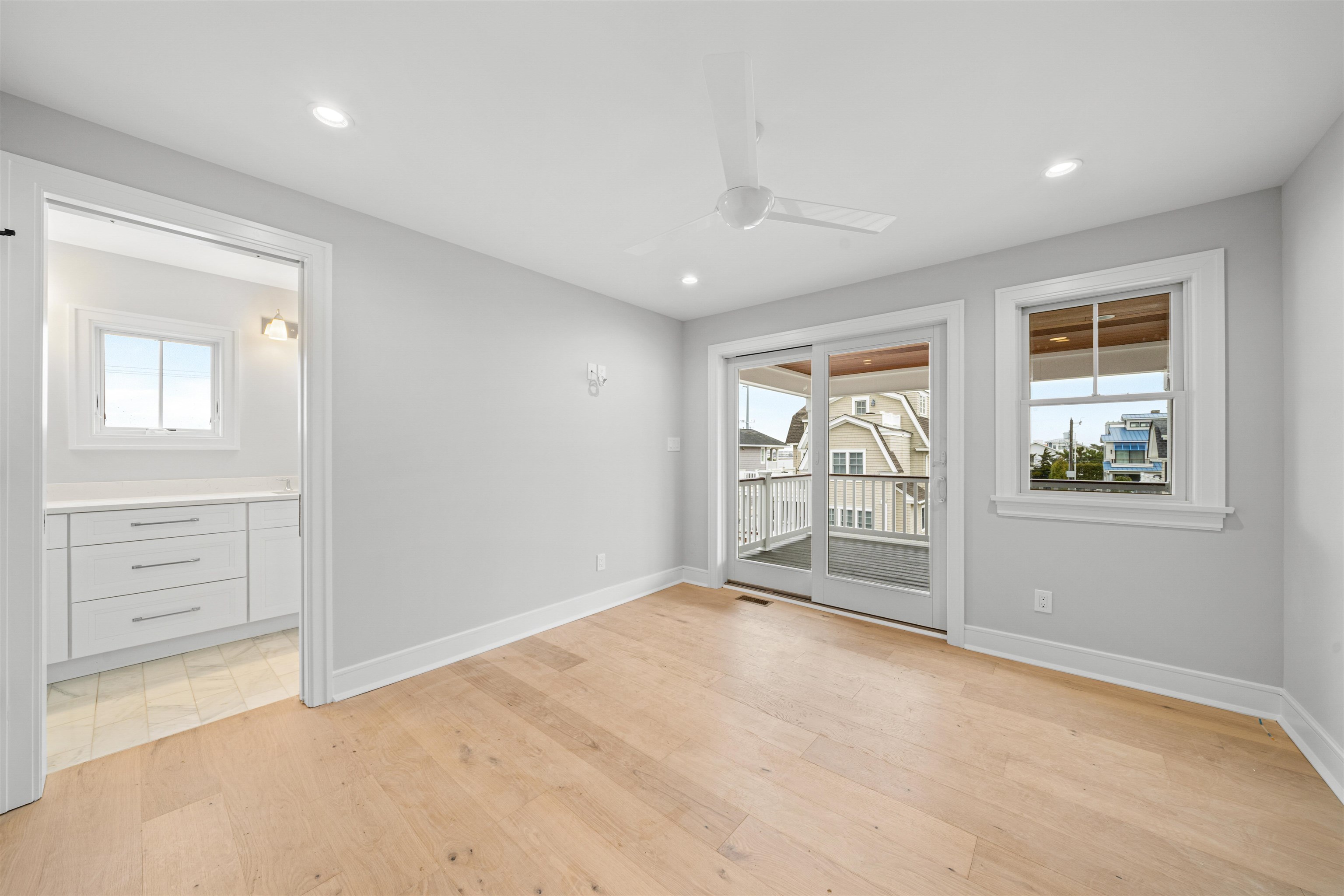 285 58th Street Avalon, NJ 08202 - Photo 47 of 50 an empty room with windows and closet