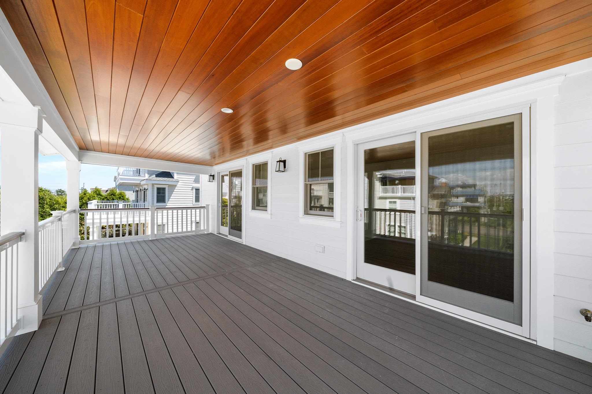 285 58th Street Avalon, NJ 08202 - Photo 9 of 50 a view of a porch with wooden floor