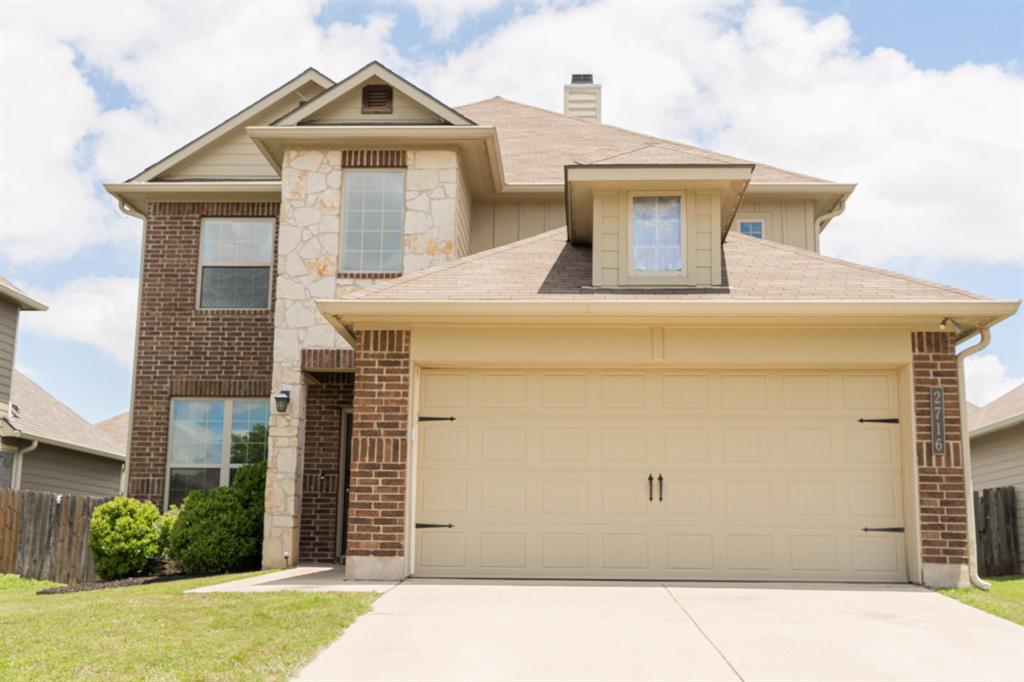 2716 Beutel Road Lorena, TX 76655 - Photo 1 of 39 a front view of a house with a garden