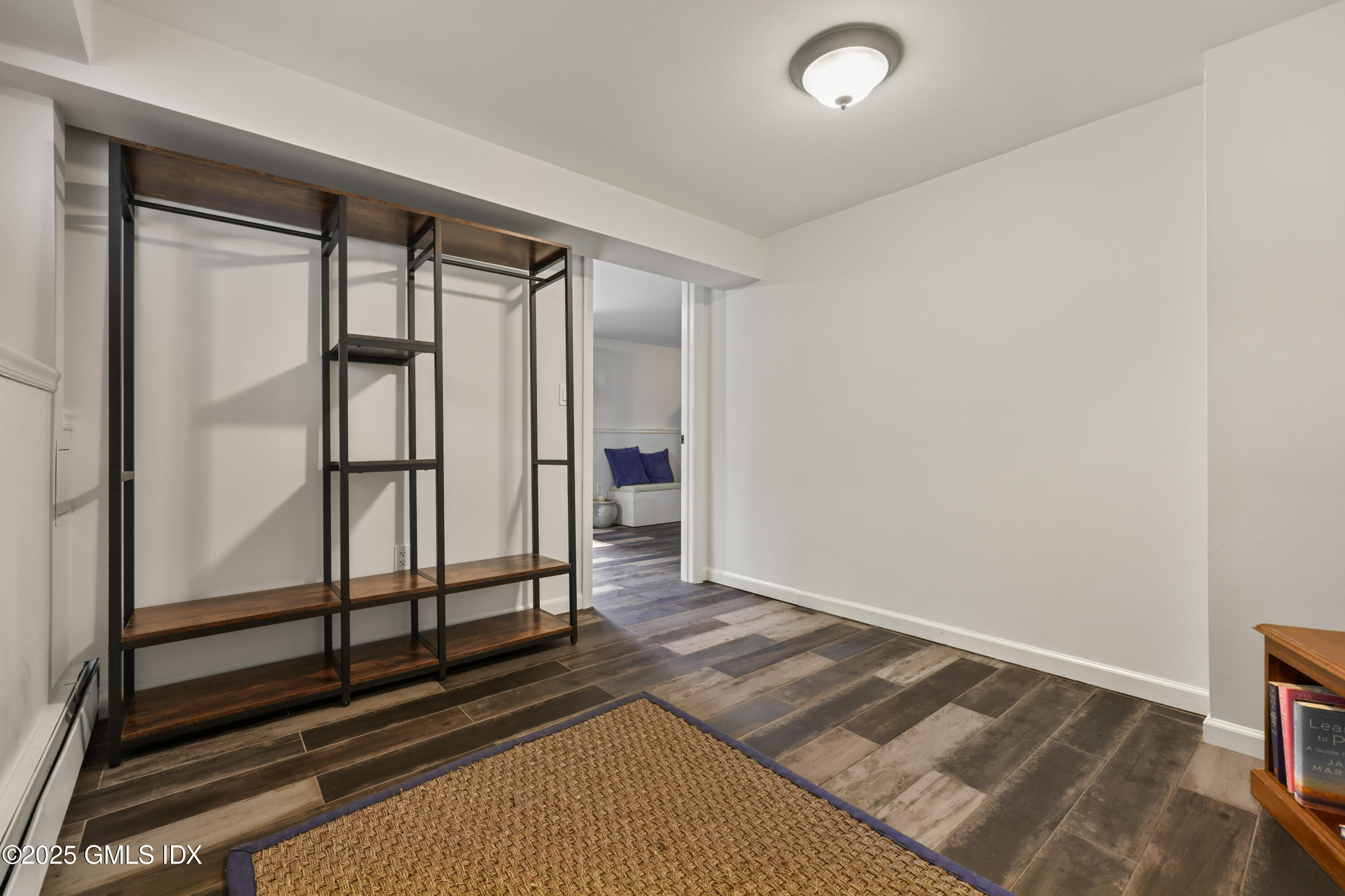 3 Janet Court, Unit 2 Riverside, CT 06878 - Photo 13 of 22 a view of a room with wooden floor
