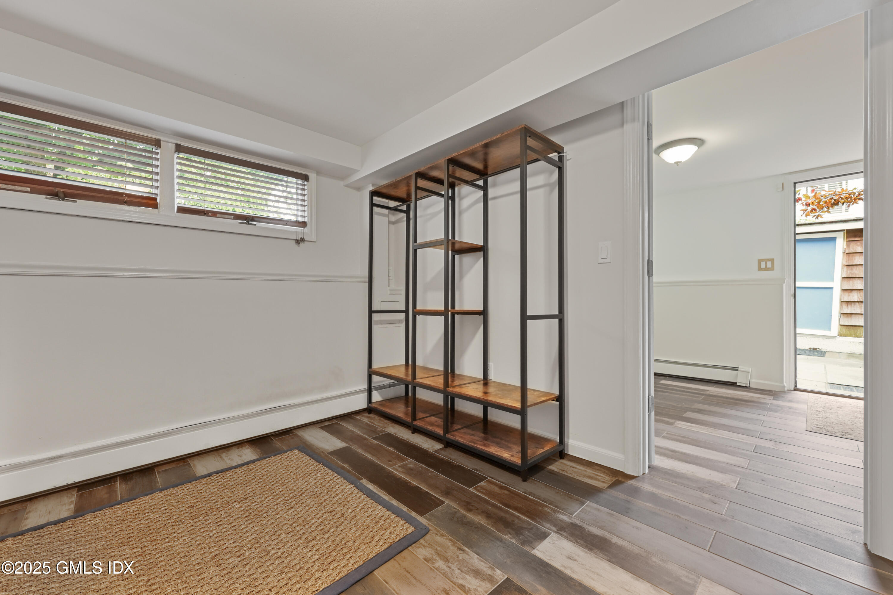 3 Janet Court, Unit 2 Riverside, CT 06878 - Photo 14 of 22 a view of entryway with wooden floor
