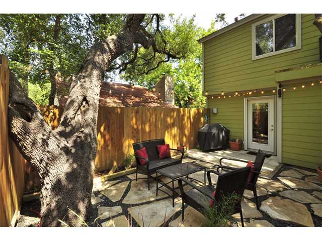 a view of outdoor dining space yard and patio
