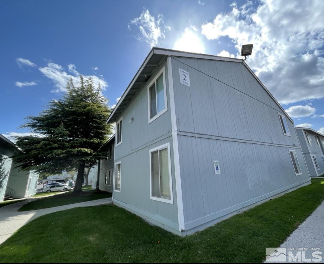 4600 Neil Road, Unit 16 Reno, NV 89502 - Photo 2 of 9 a view of a house with a yard