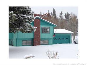 718 Deer Path Road Dillon, CO 80435 - Photo 1 of 6 a view of a house next to a yard