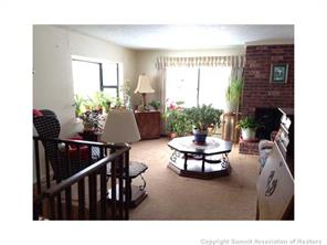 718 Deer Path Road Dillon, CO 80435 - Photo 2 of 6 a living room with furniture and a table