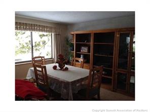 718 Deer Path Road Dillon, CO 80435 - Photo 3 of 6 a living room with furniture a window and a table