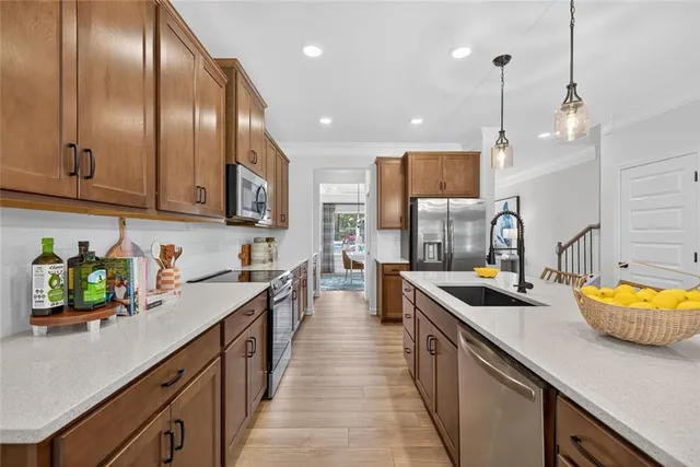 a kitchen with lots of counter space and window