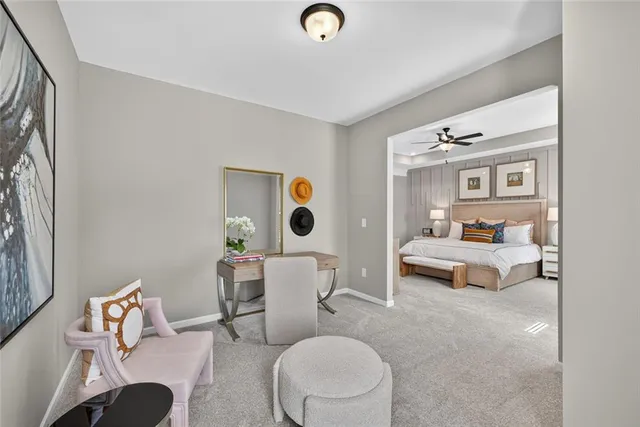 a living room with furniture and a lamp