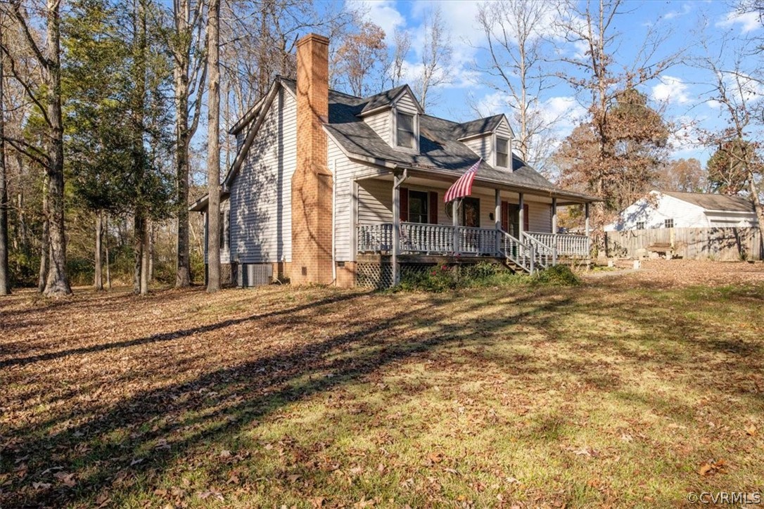 11124 Alanthus Road Midlothian, VA 23112 - Photo 1 of 28 a view of a large white house with a yard covered with snow