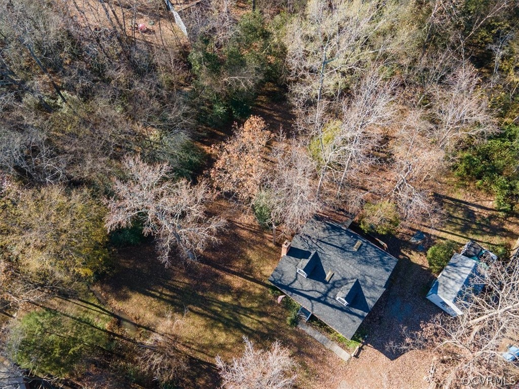 11124 Alanthus Road Midlothian, VA 23112 - Photo 17 of 28 a view of a yard with wooden fence