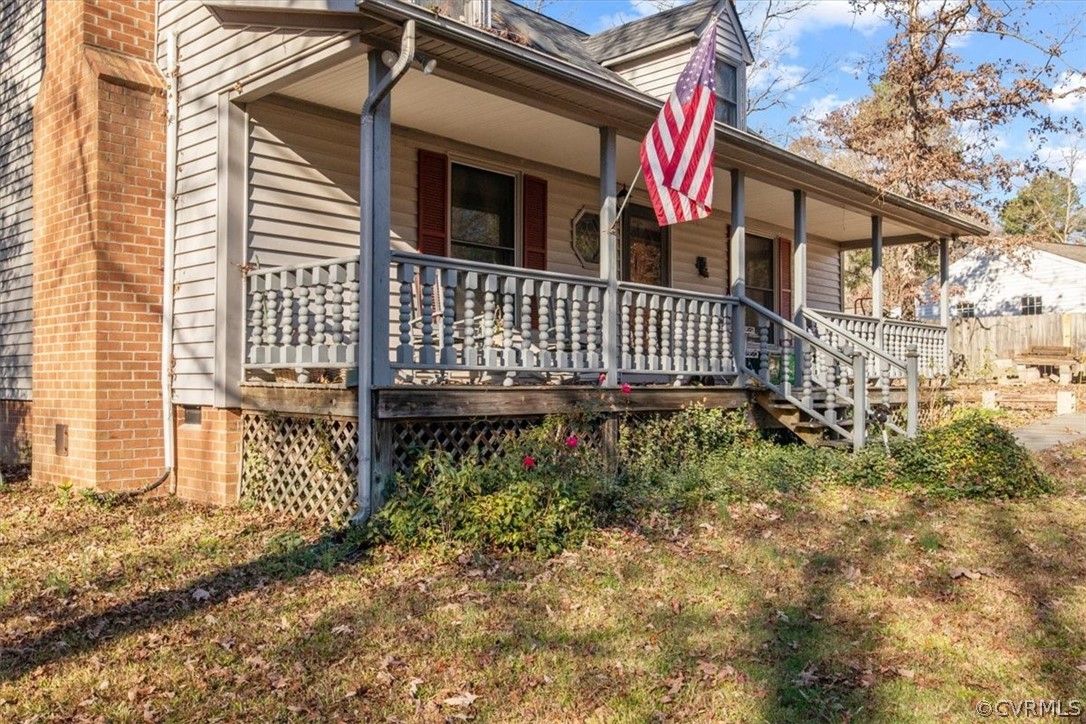11124 Alanthus Road Midlothian, VA 23112 - Photo 22 of 28 a front view of a house with a yard