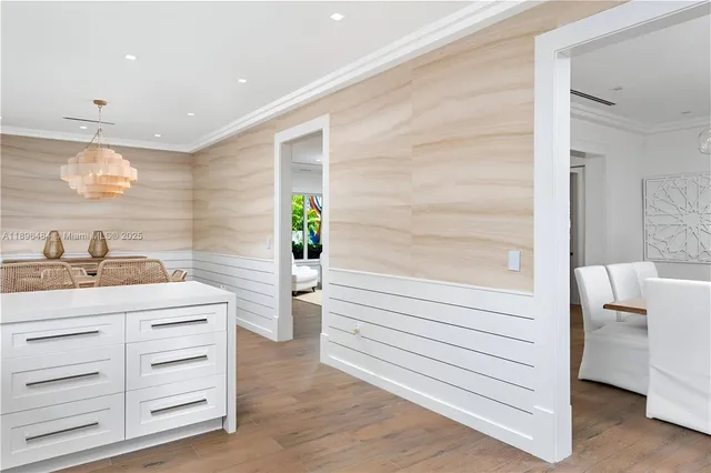 a bathroom with a sink a mirror and a shower