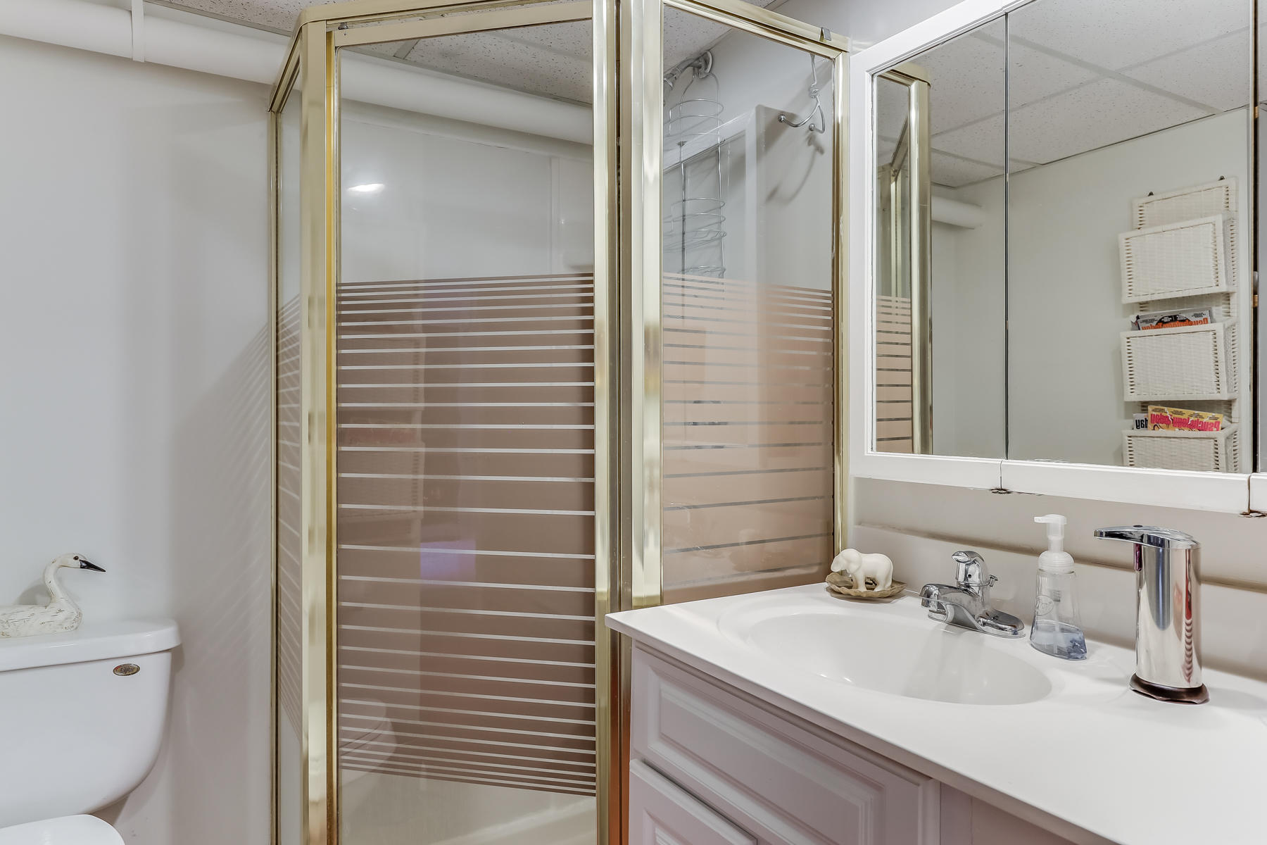39 Nobska Road Mashpee, MA 02649 - Photo 29 of 33 a bathroom with a sink and a mirror