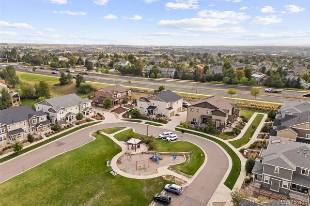 a front view of a house with yard