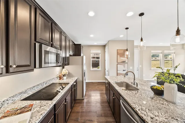 a kitchen with granite countertop lots of counter top space