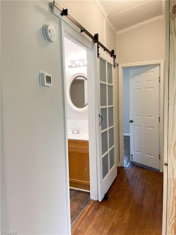 1352 Gravitte Road Pilot Mountain, NC 27041 - Photo 20 of 43 hallway to bedrooms and full bath