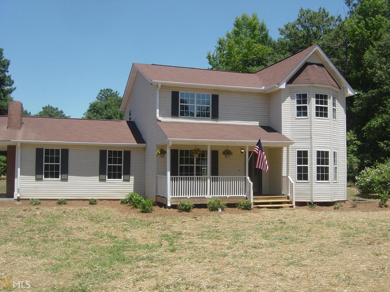 3210 Spears Road Madison, GA 30650 - Photo 1 of 1 front view of a house with a yard