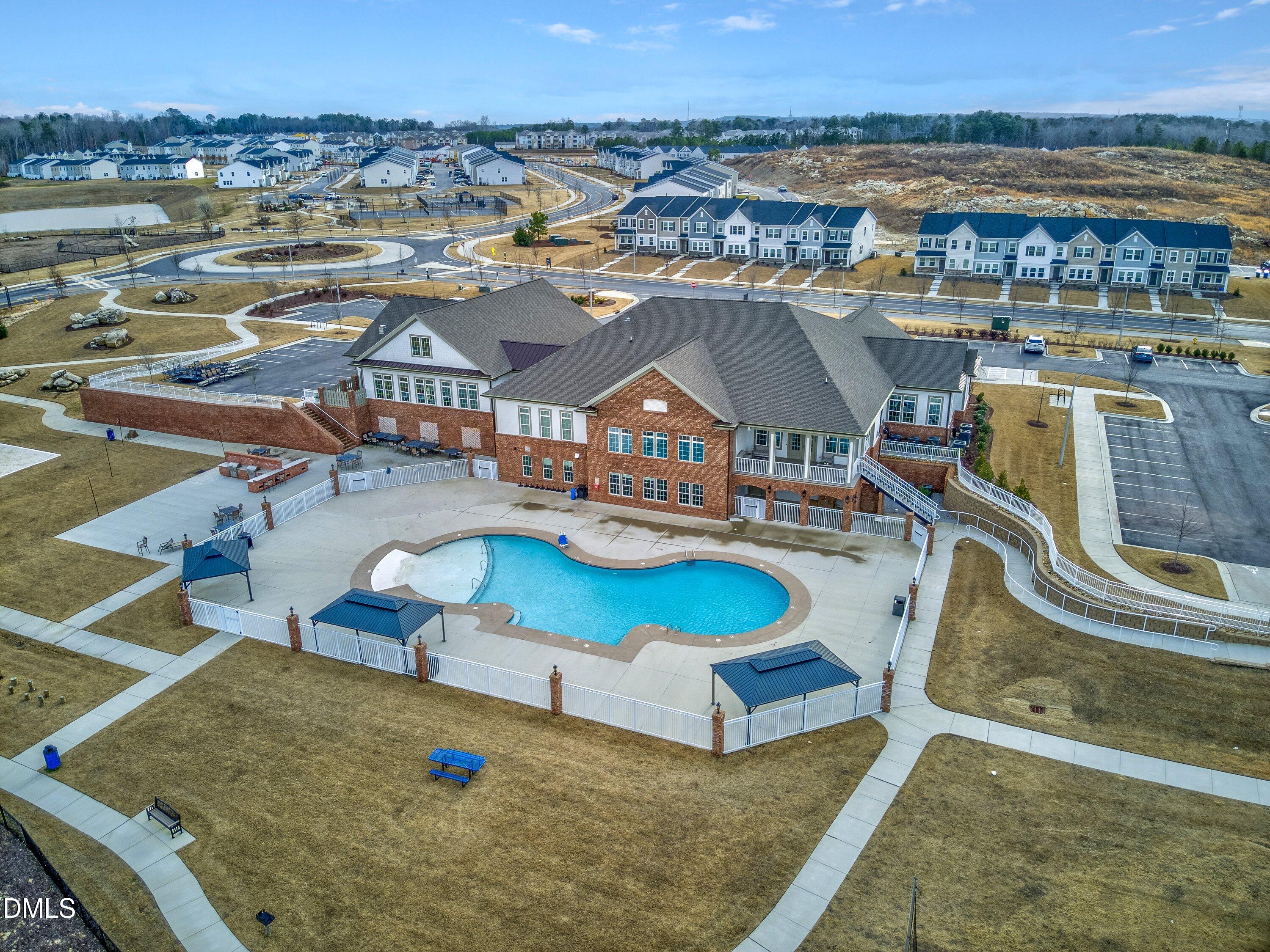 4949 Microcline Trail Raleigh, NC 27610 - Photo 18 of 42 an aerial view of a house with a swimming pool