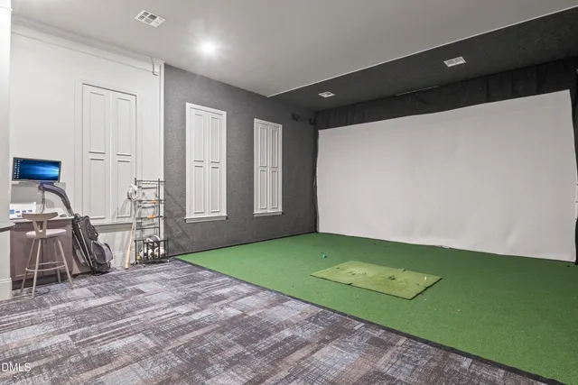 a large kitchen with lots of counter space a sink appliances and cabinets